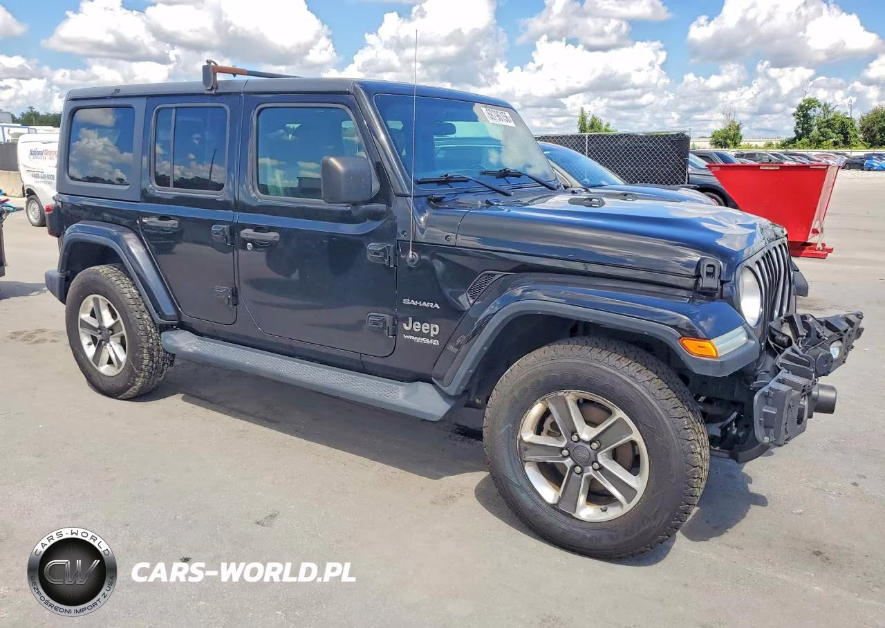 2019 Jeep Wrangler Unlimited Sahara VIN:1C4HJXEN0KW690510 - 4