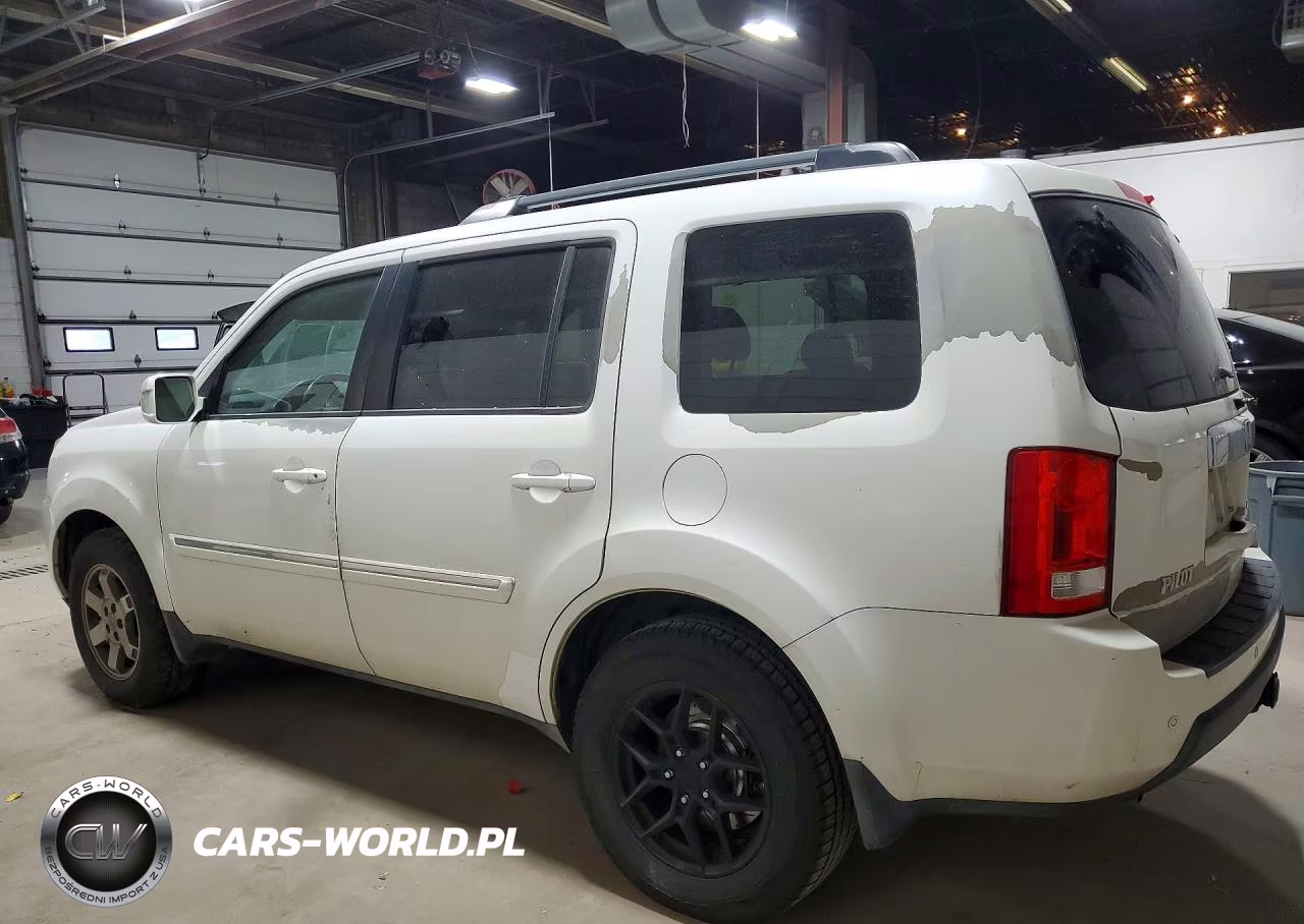 2011 Honda Pilot Touring VIN:5FNYF4H92BB061107 - 2