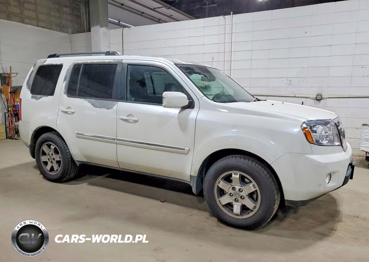 2011 Honda Pilot Touring VIN:5FNYF4H92BB061107 - 4
