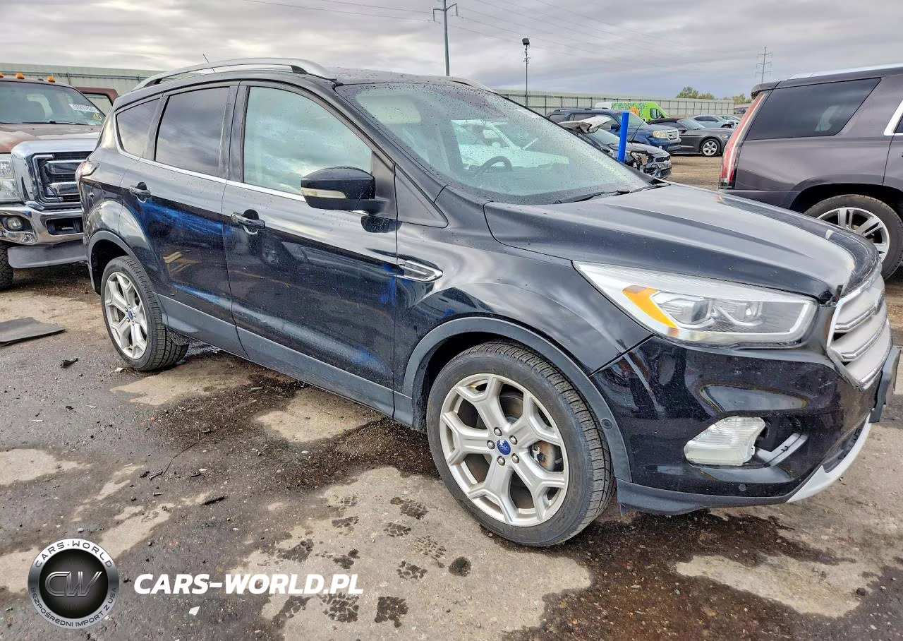 2017 Ford Escape Titanium VIN:1FMCU9J91HUA89175 - 4