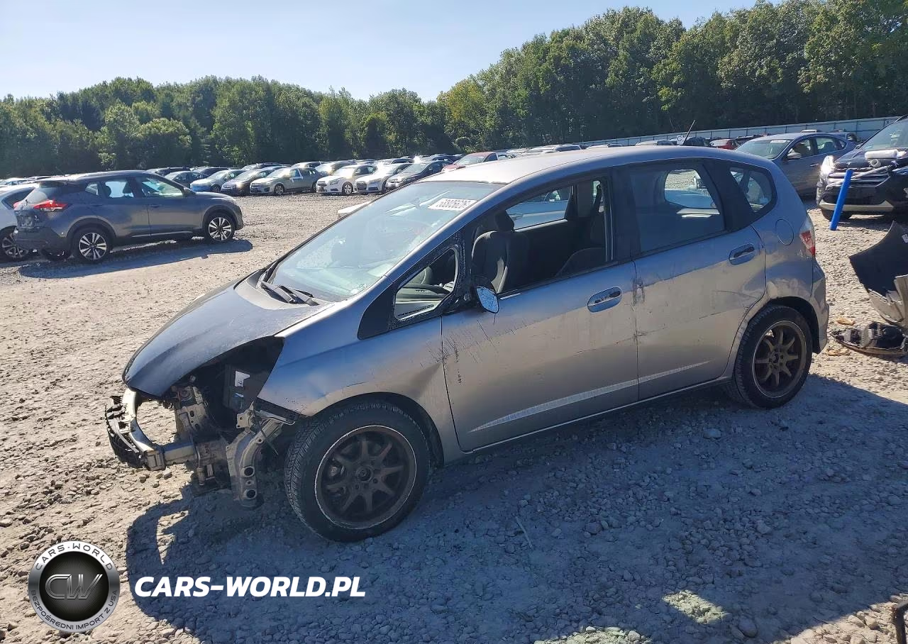 2009 Honda Fit VIN:JHMGE88279S067442 - 1