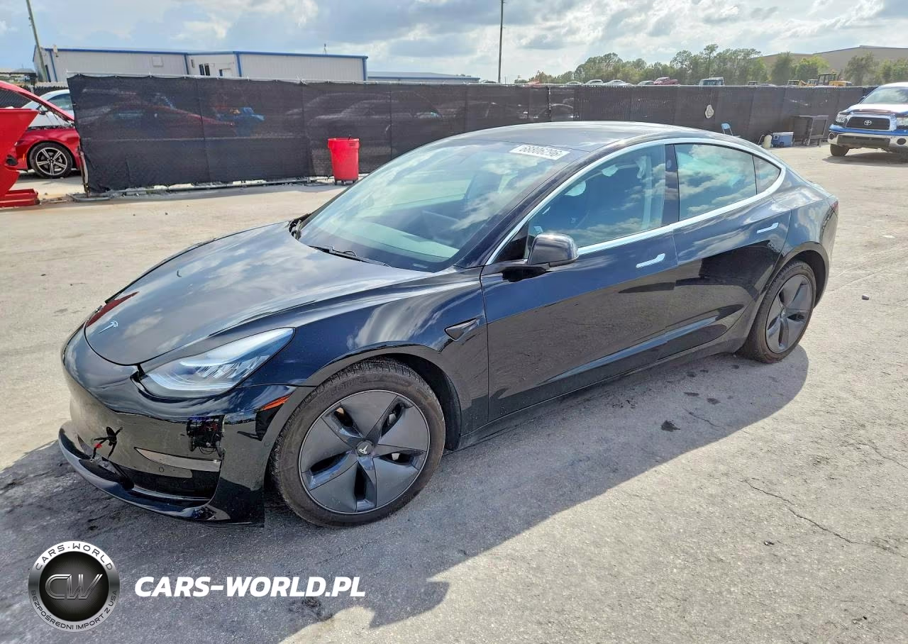 2019 Tesla Model 3 VIN:5YJ3E1EB0KF385837 - 1