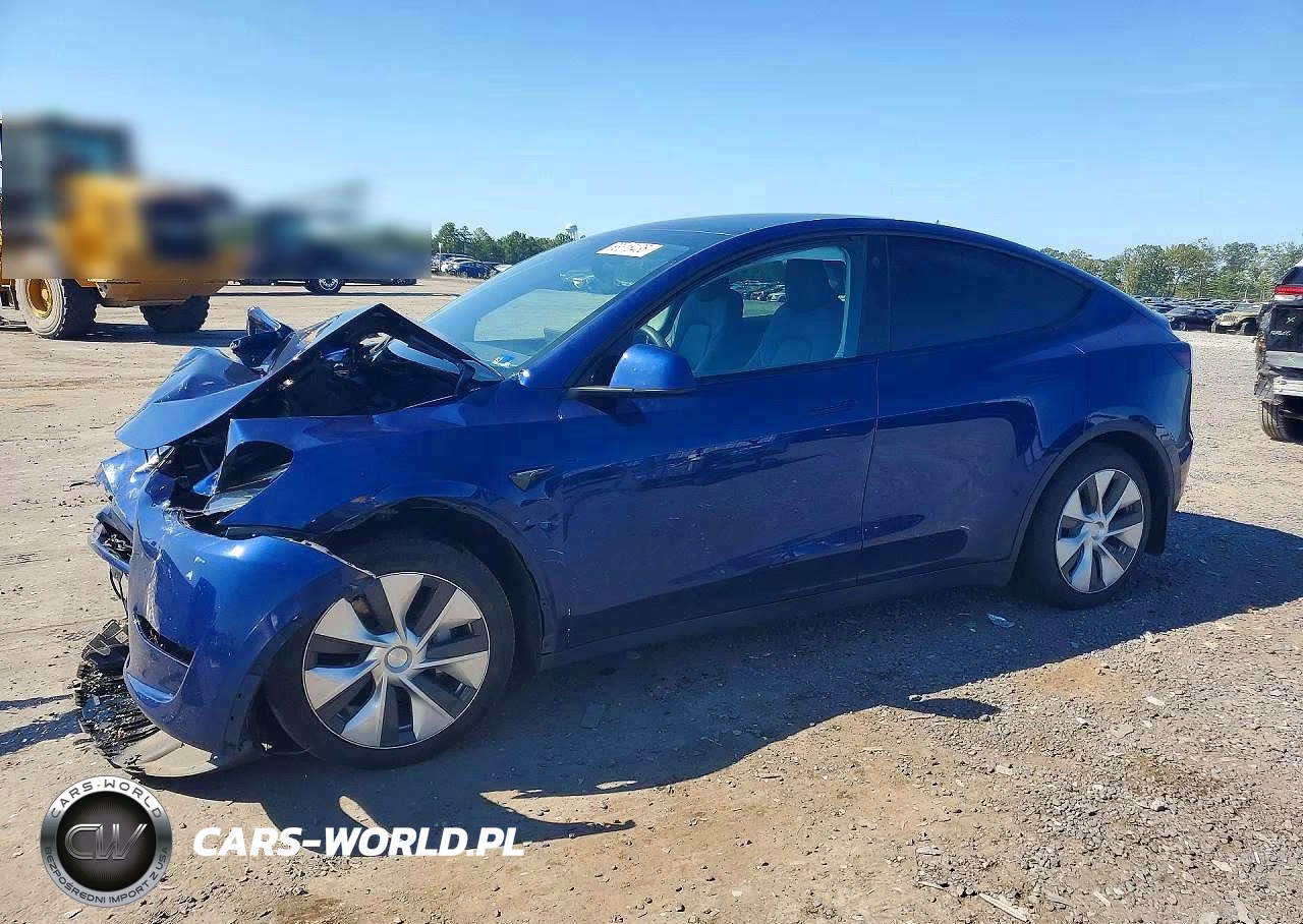 2023 Tesla Model Y VIN:7SAYGAEE0PF703654 - 1