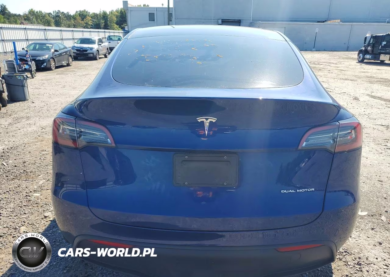 2023 Tesla Model Y VIN:7SAYGAEE0PF703654 - 6