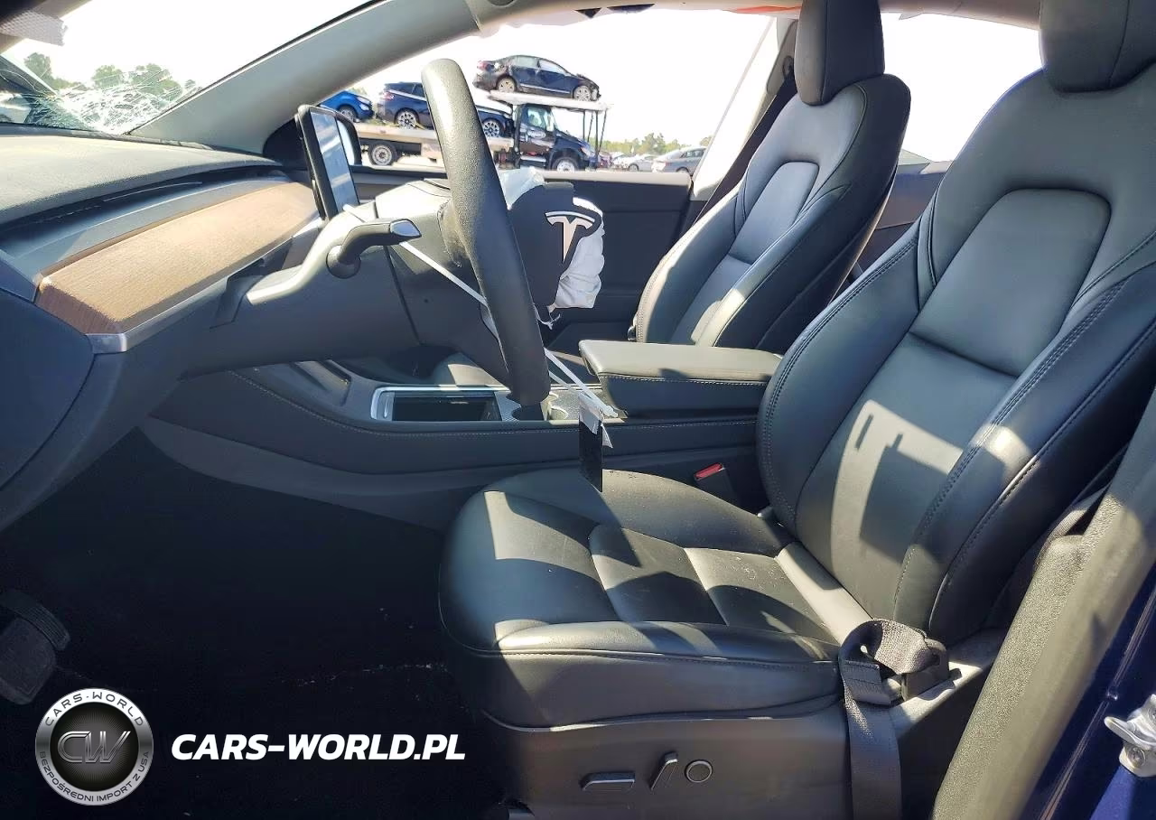2023 Tesla Model Y VIN:7SAYGAEE0PF703654 - 7