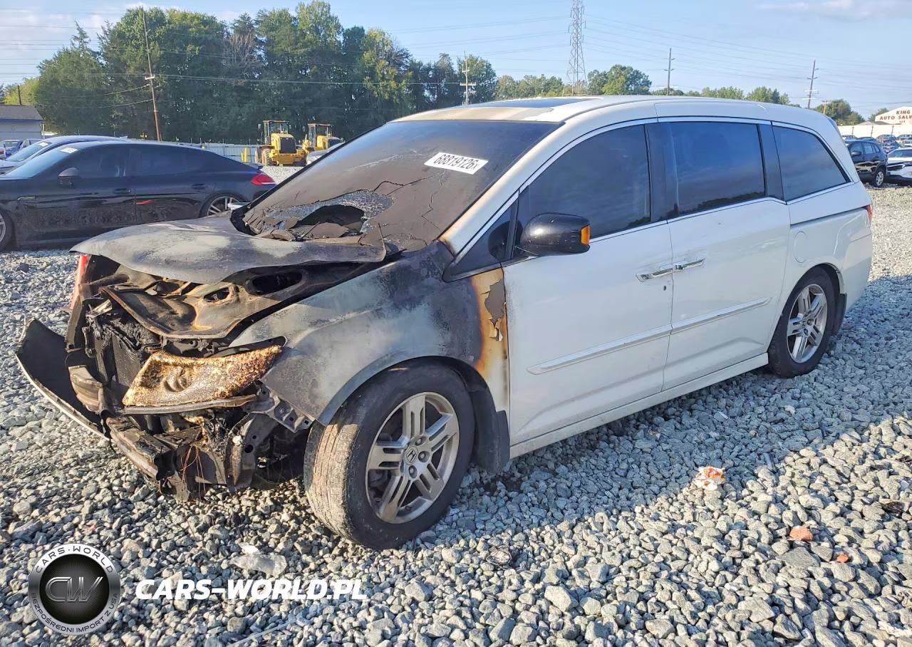 2012 Honda Odyssey Touring VIN:5FNRL5H91CB047025 - 1