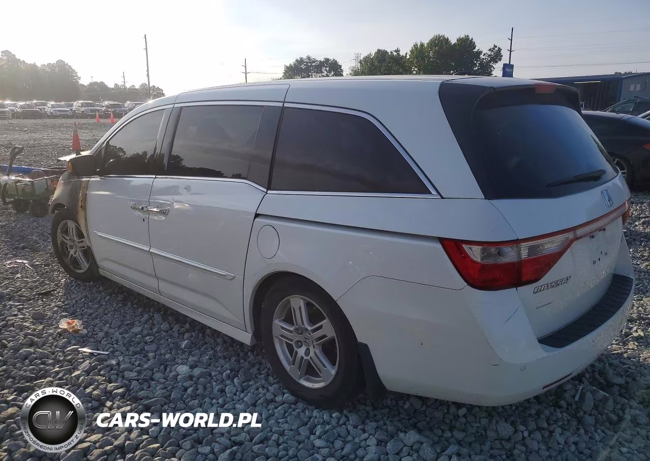 2012 Honda Odyssey Touring VIN:5FNRL5H91CB047025 - 2
