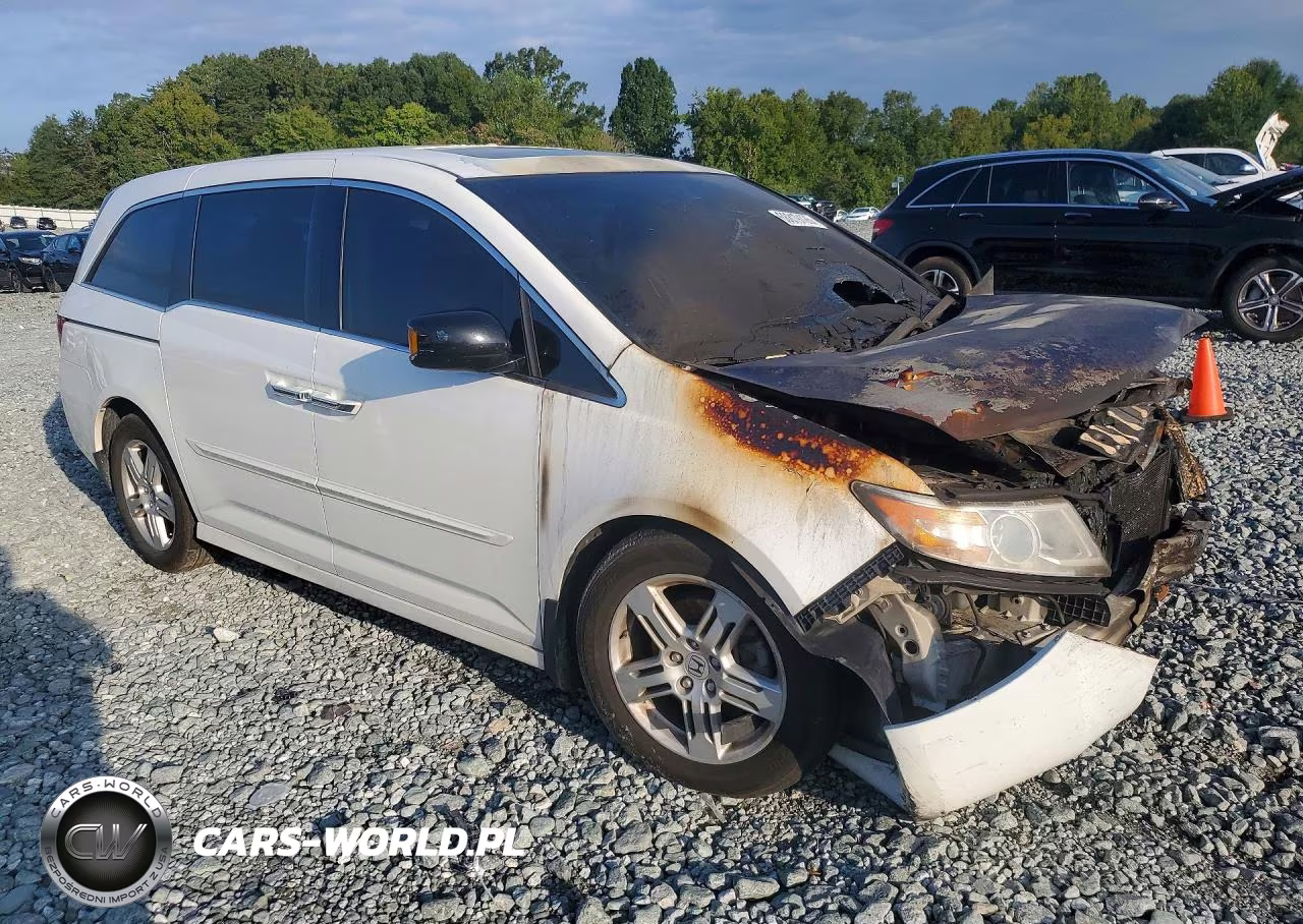 2012 Honda Odyssey Touring VIN:5FNRL5H91CB047025 - 4