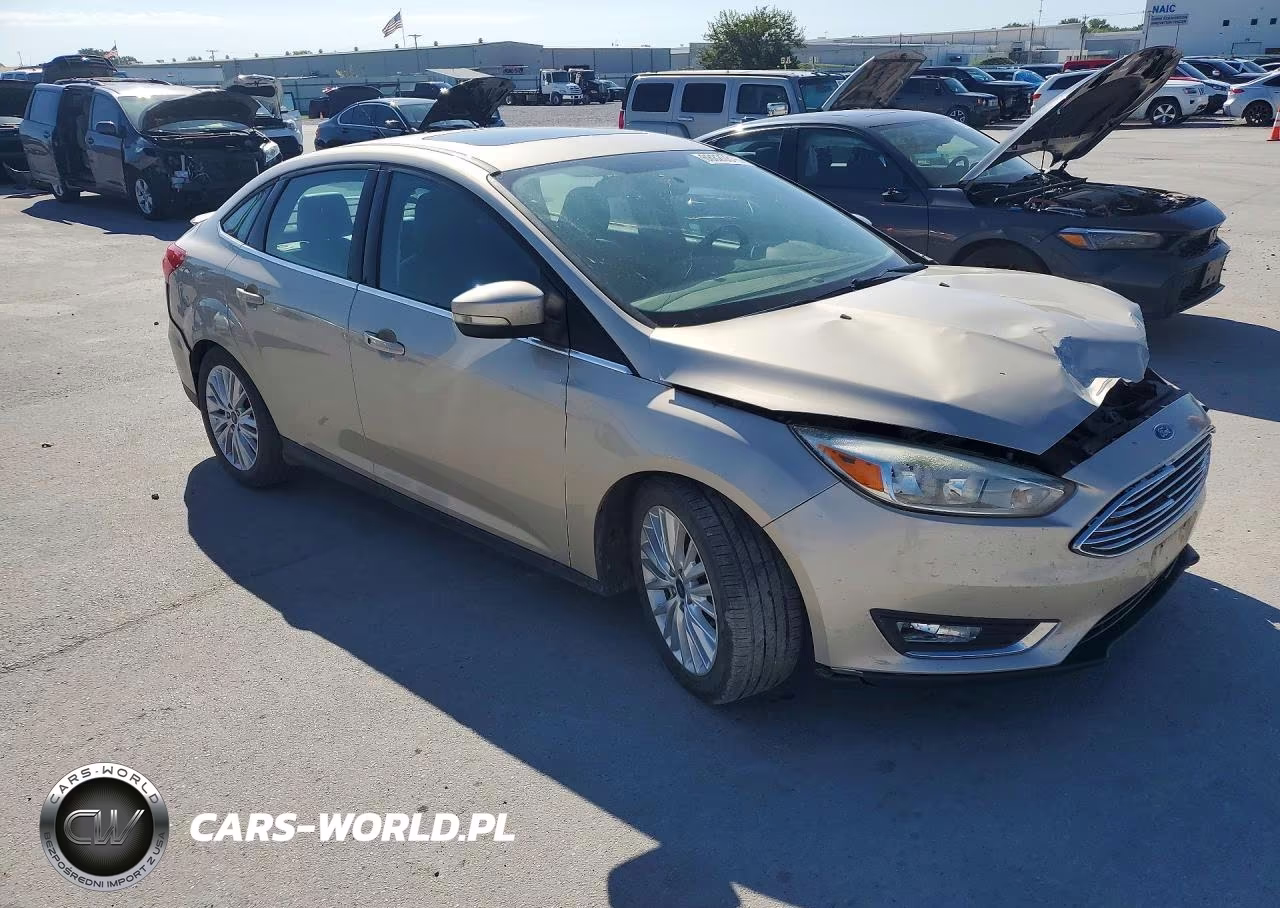 2017 Ford Focus Titanium VIN:1FADP3J27HL238345 - 4
