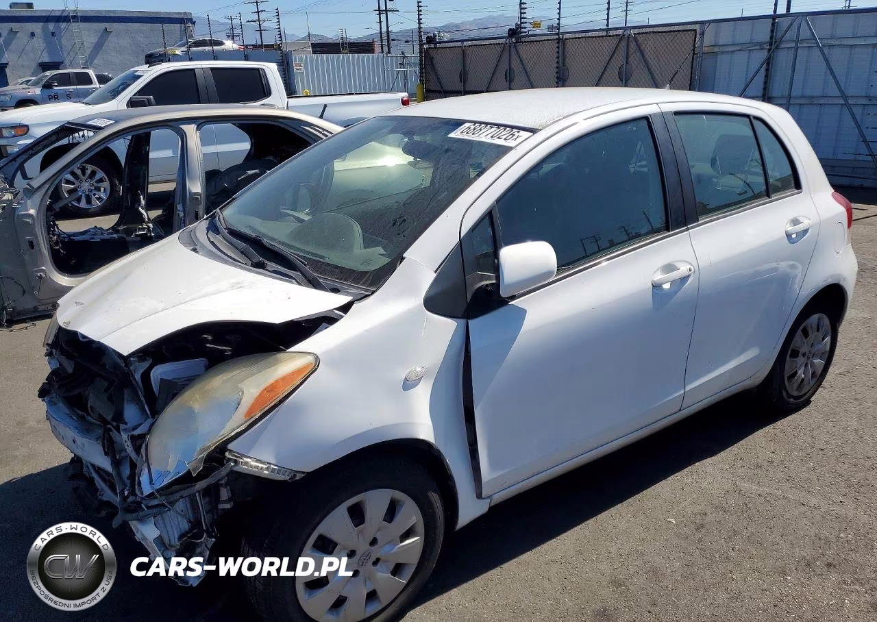 2011 Toyota Yaris Base VIN:JTDKT4K38B5331686 - 1