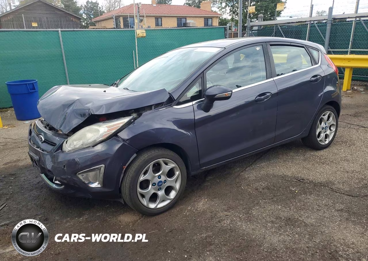 2013 Ford Fiesta Titanium VIN:3FADP4FJ5DM110975 - 1
