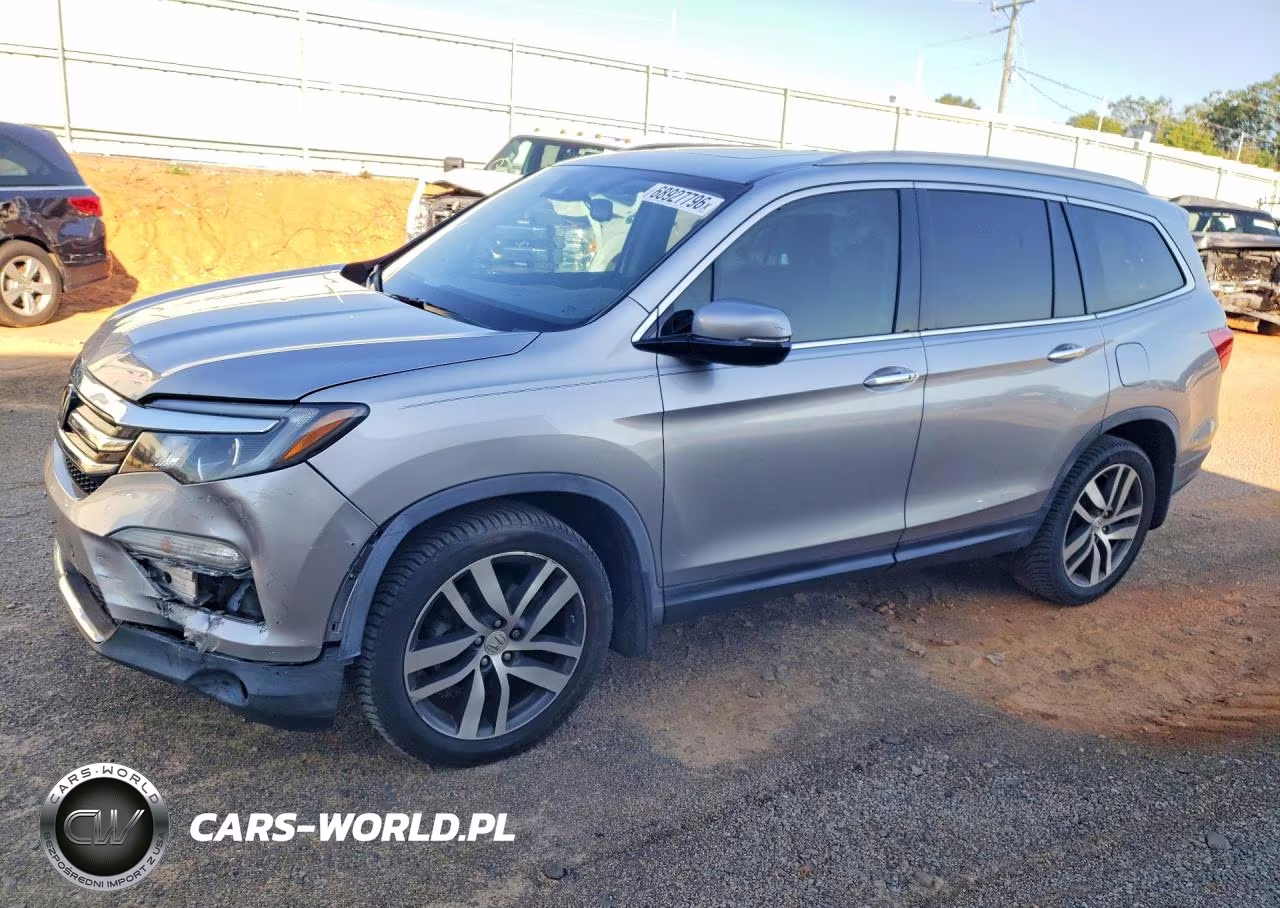 2017 Honda Pilot Touring VIN:5FNYF5H90HB005827 - 1