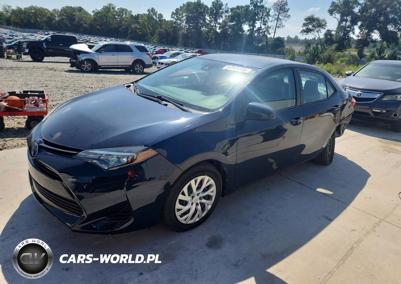 2018 Toyota Corolla Le VIN:5YFBURHE6JP819829 - 1
