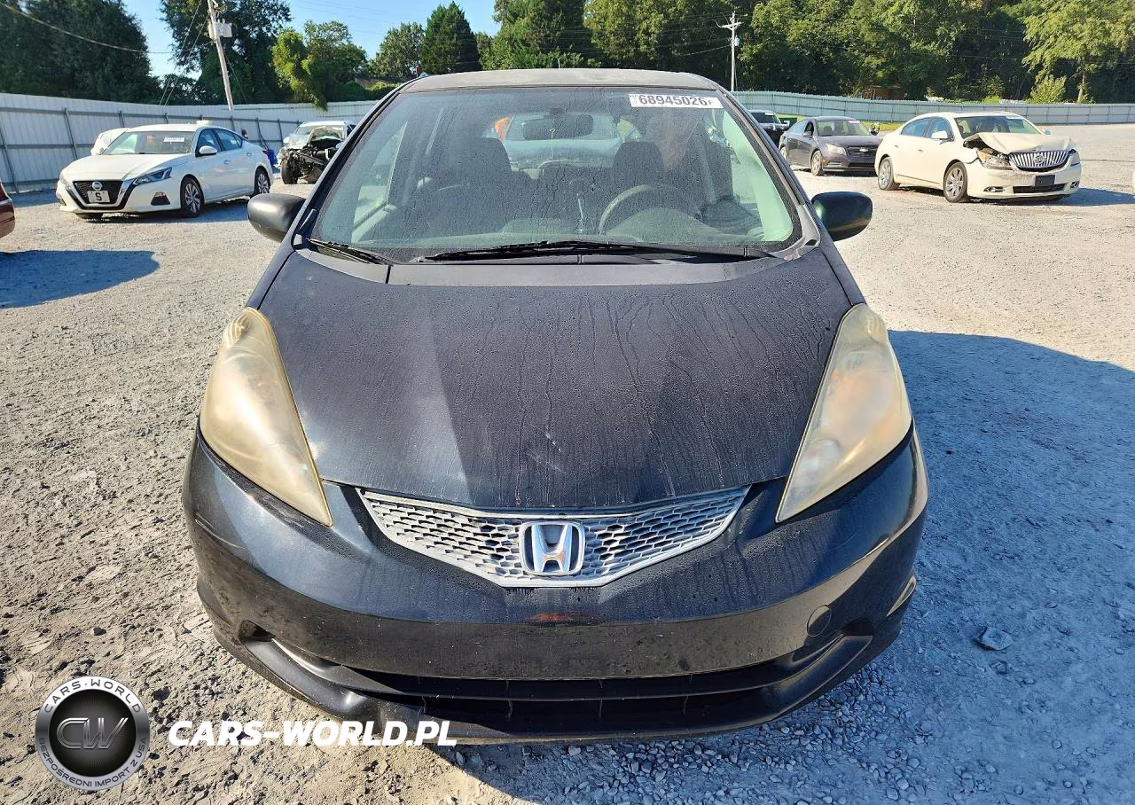 2009 Honda Fit VIN:JHMGE88259S057623 - 5