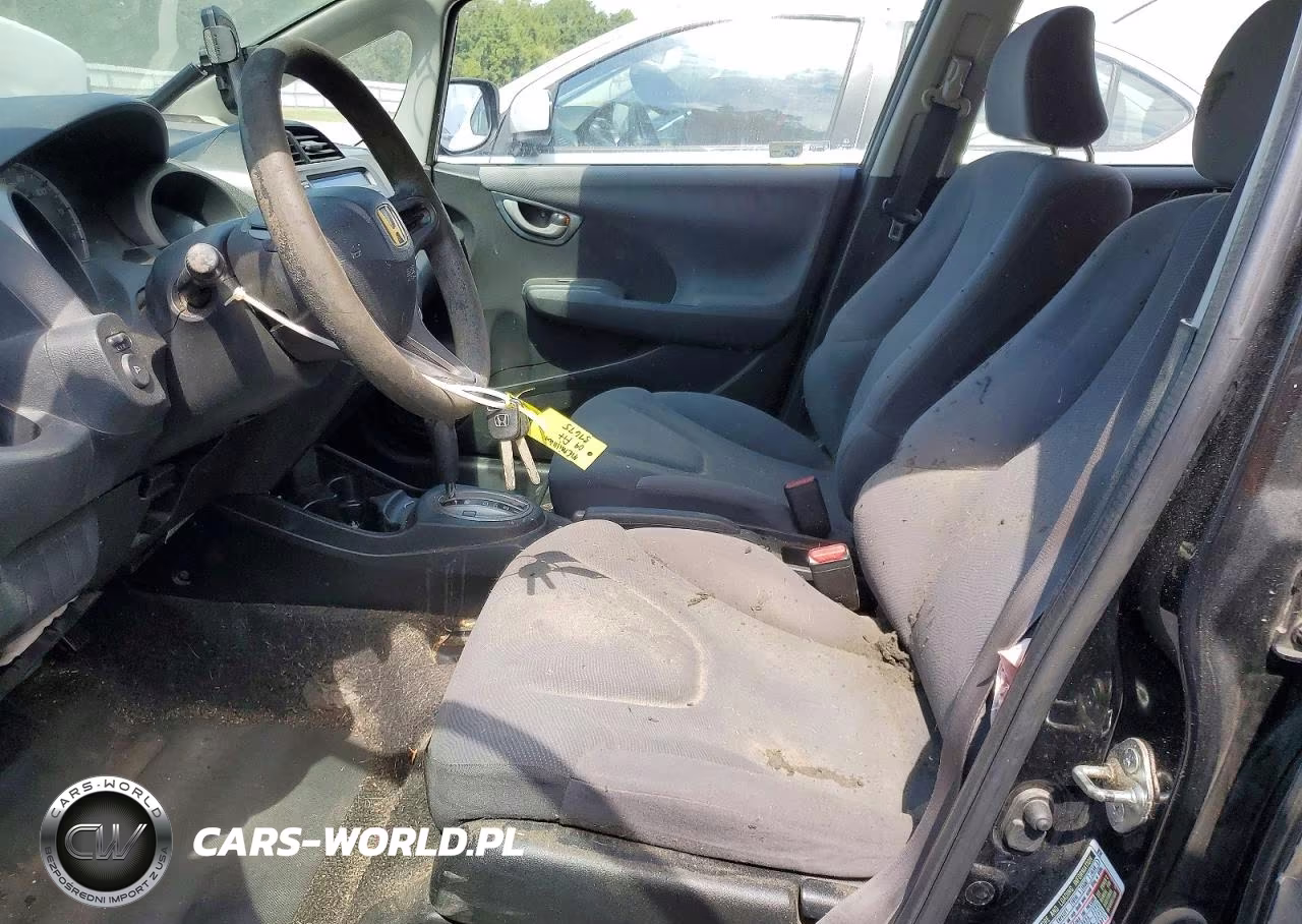 2009 Honda Fit VIN:JHMGE88259S057623 - 7