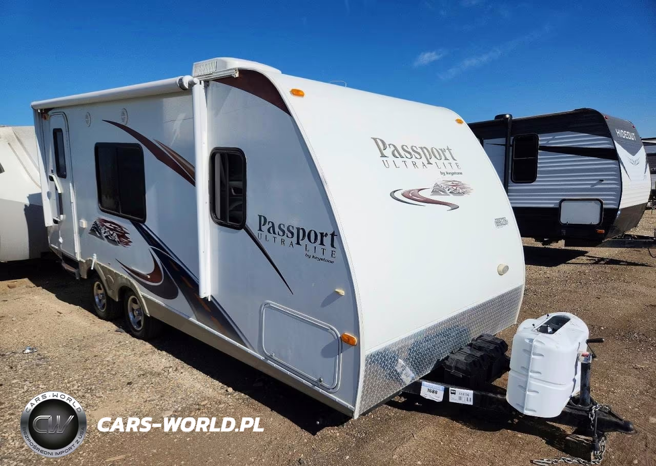 2011 Keystone Passport Camper VIN:4YDT19520BX414136 - 1