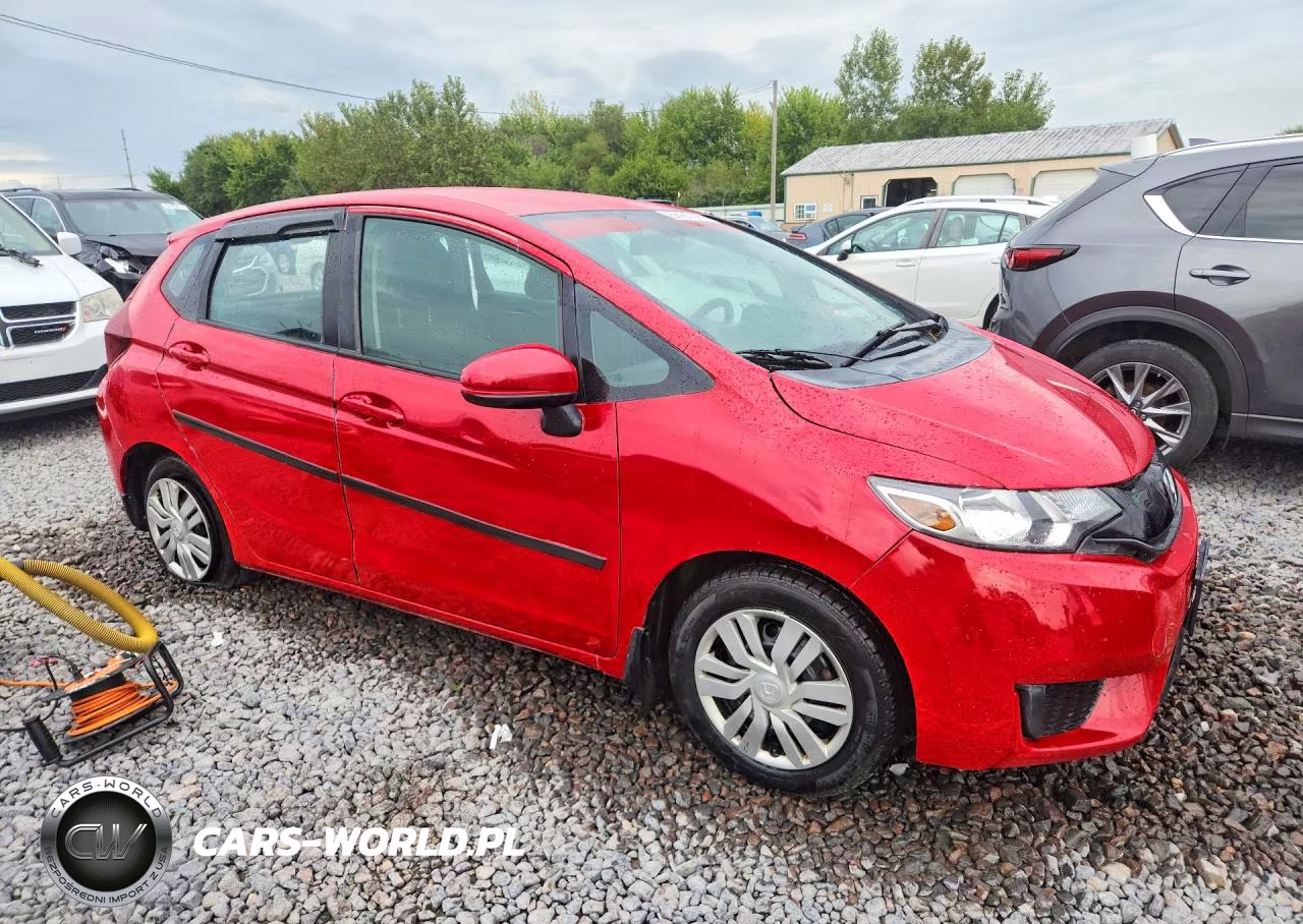 2015 Honda Fit Lx VIN:3HGGK5H53FM739358 - 4