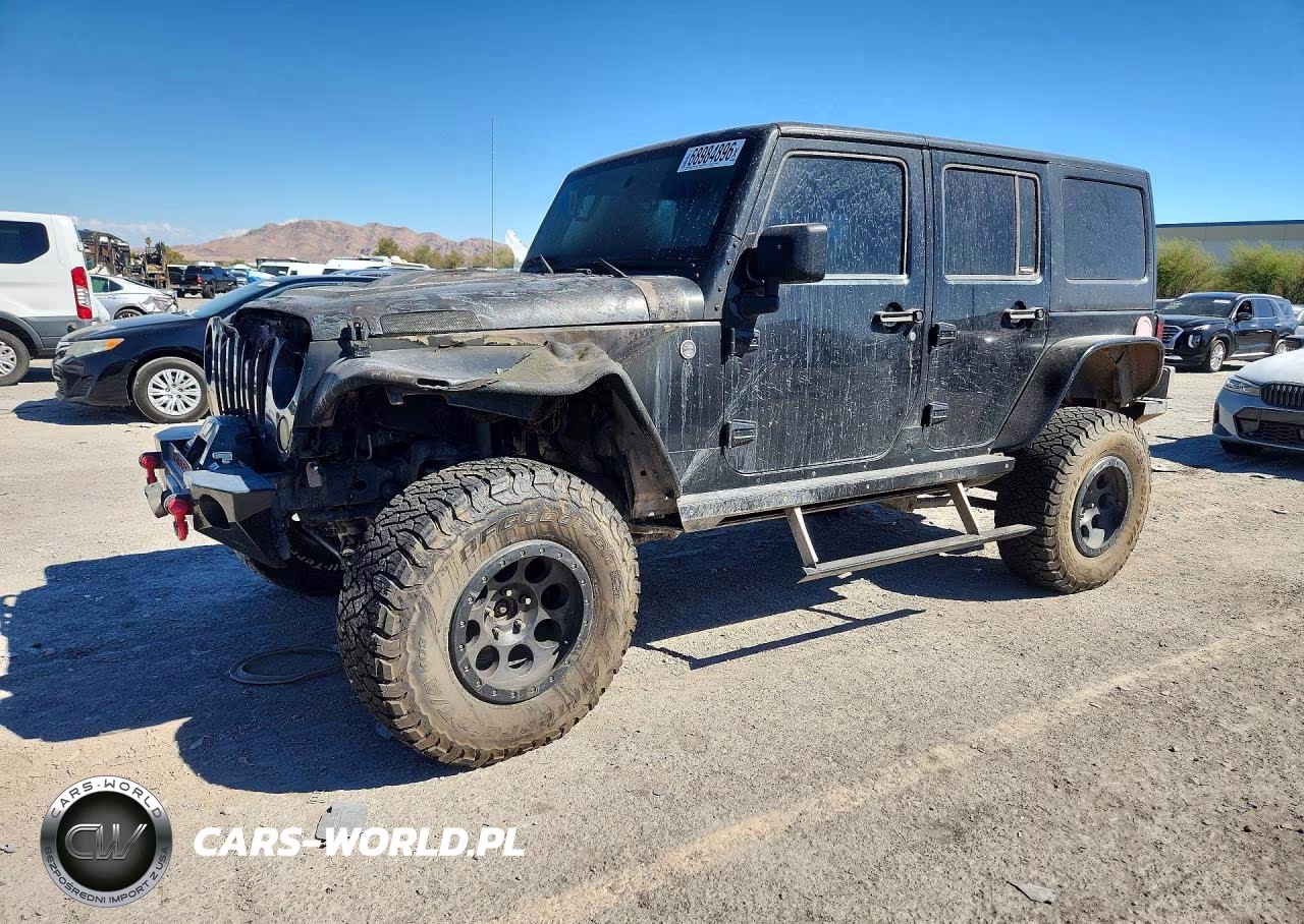 2010 Jeep Wrangler Unlimited Rubicon VIN:1J4BA6H14AL166988 - 1