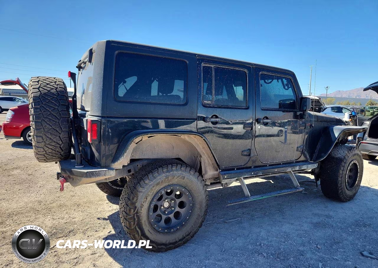 2010 Jeep Wrangler Unlimited Rubicon VIN:1J4BA6H14AL166988 - 3