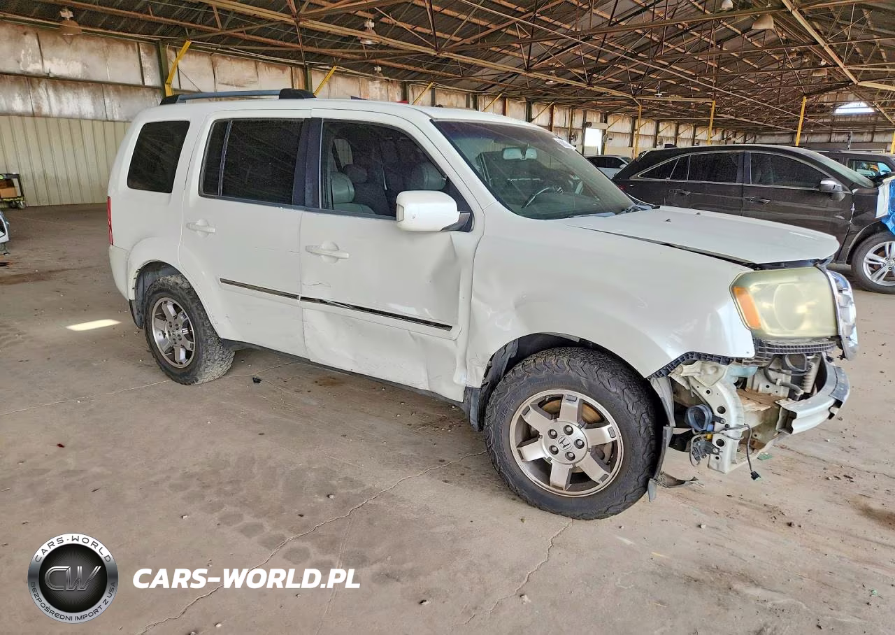 2011 Honda Pilot Touring VIN:5FNYF3H91BB007260 - 4