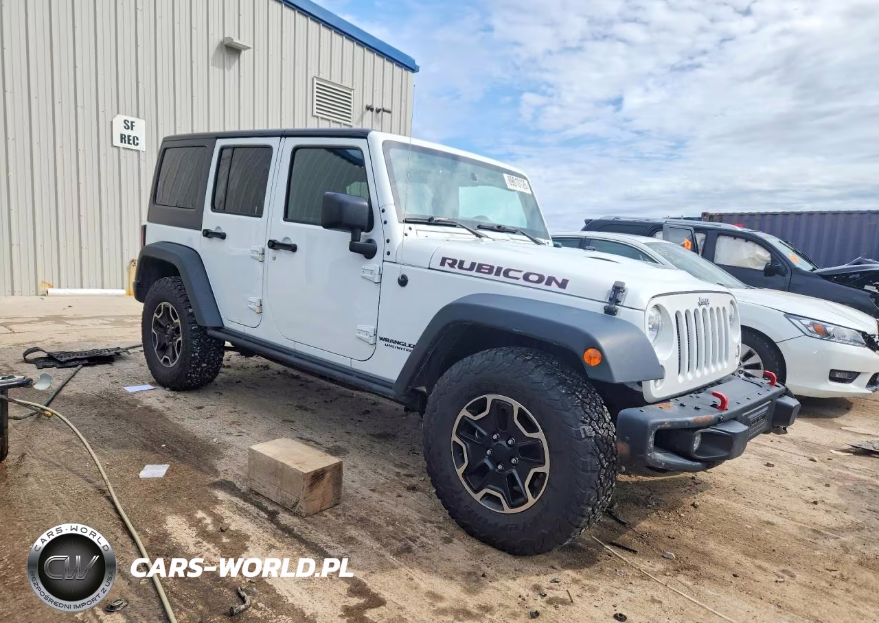 2016 Jeep Wrangler Unlimited Rubicon VIN:1C4HJWFG1GL169606 - 4