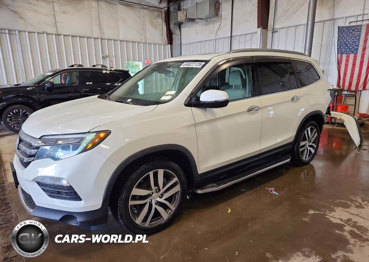 2018 Honda Pilot Elite VIN:5FNYF6H06JB014142 - 1