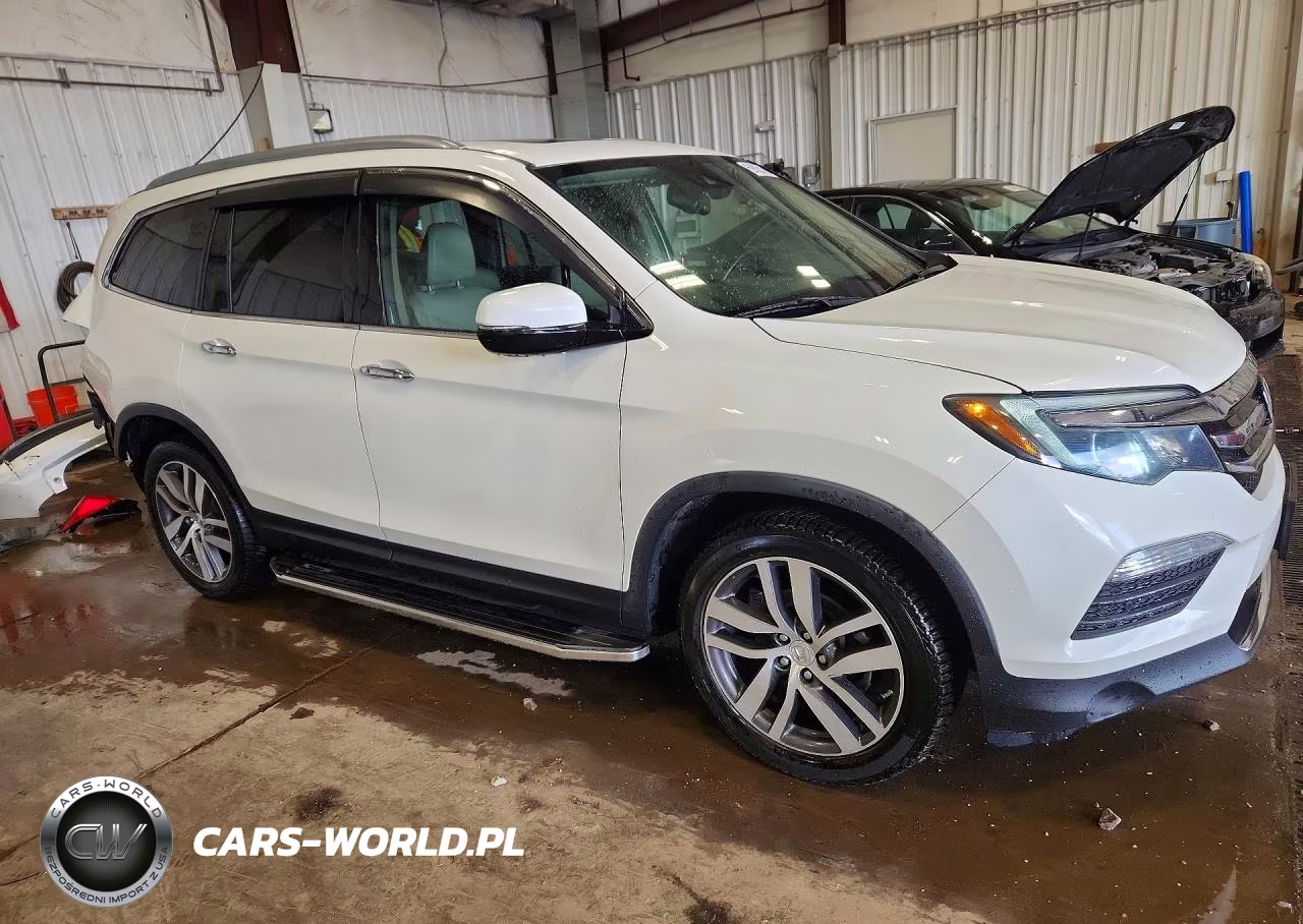 2018 Honda Pilot Elite VIN:5FNYF6H06JB014142 - 4