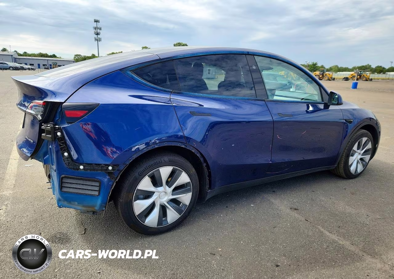 2023 Tesla Model Y VIN:7SAYGAEE0PF977808 - 3