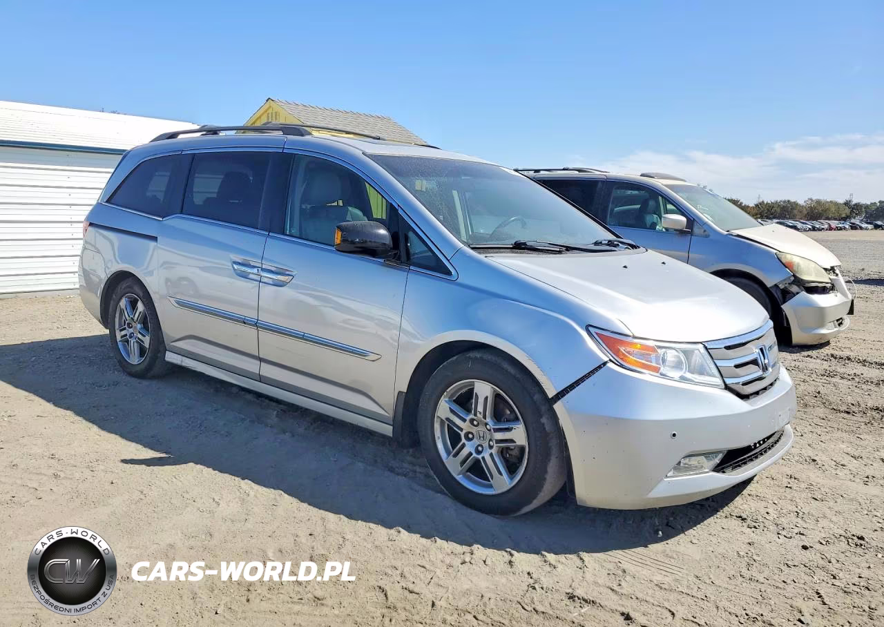 2012 Honda Odyssey Touring VIN:5FNRL5H91CB095270 - 4