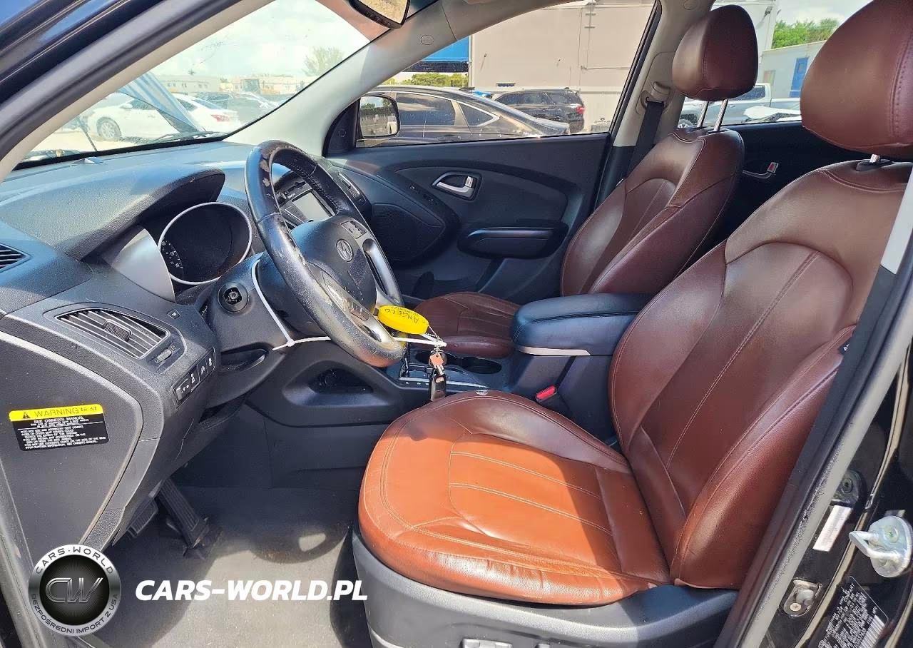 2012 Hyundai Tucson Limited VIN:KM8JUCAC1CU537438 - 7