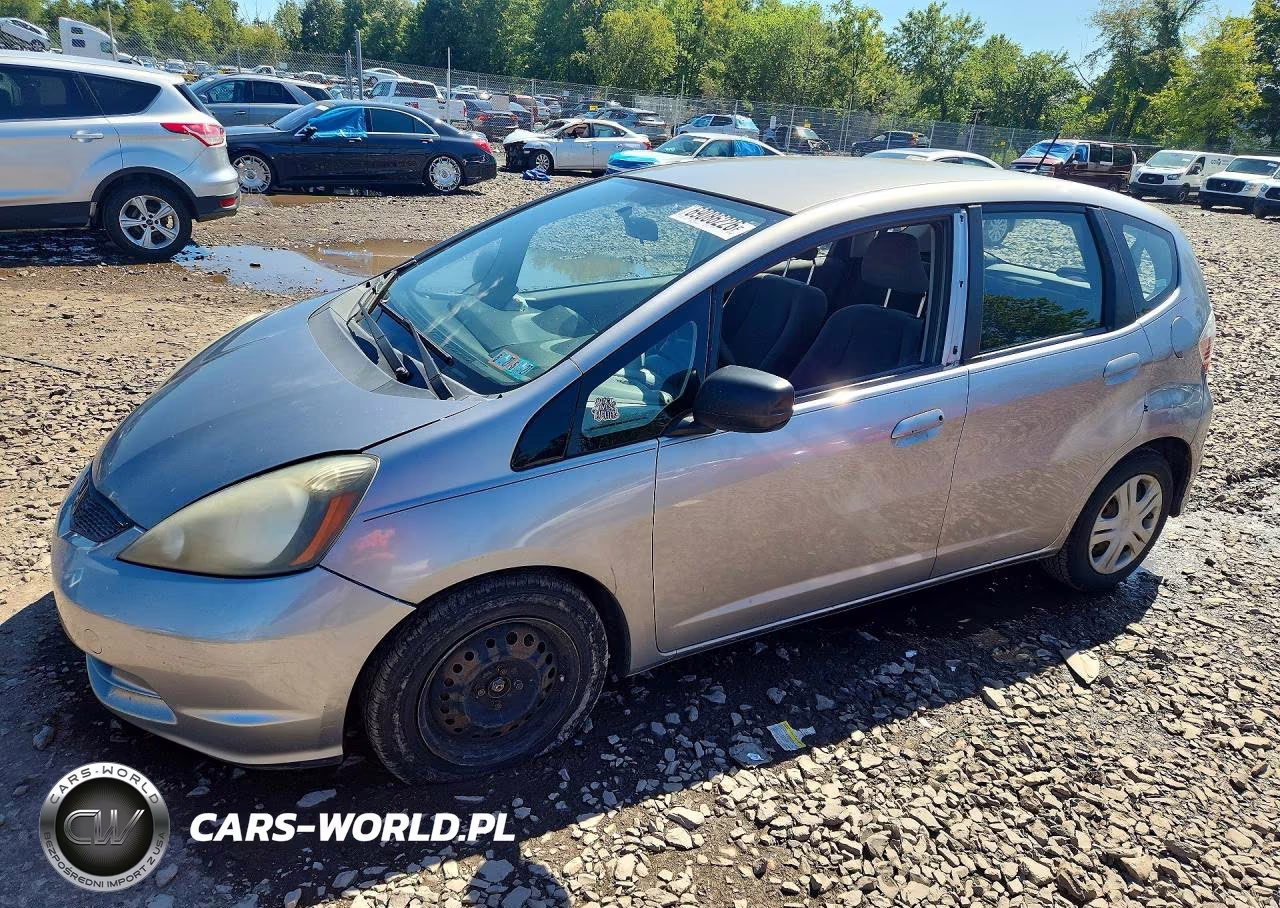 2009 Honda Fit VIN:JHMGE88259S032964 - 1