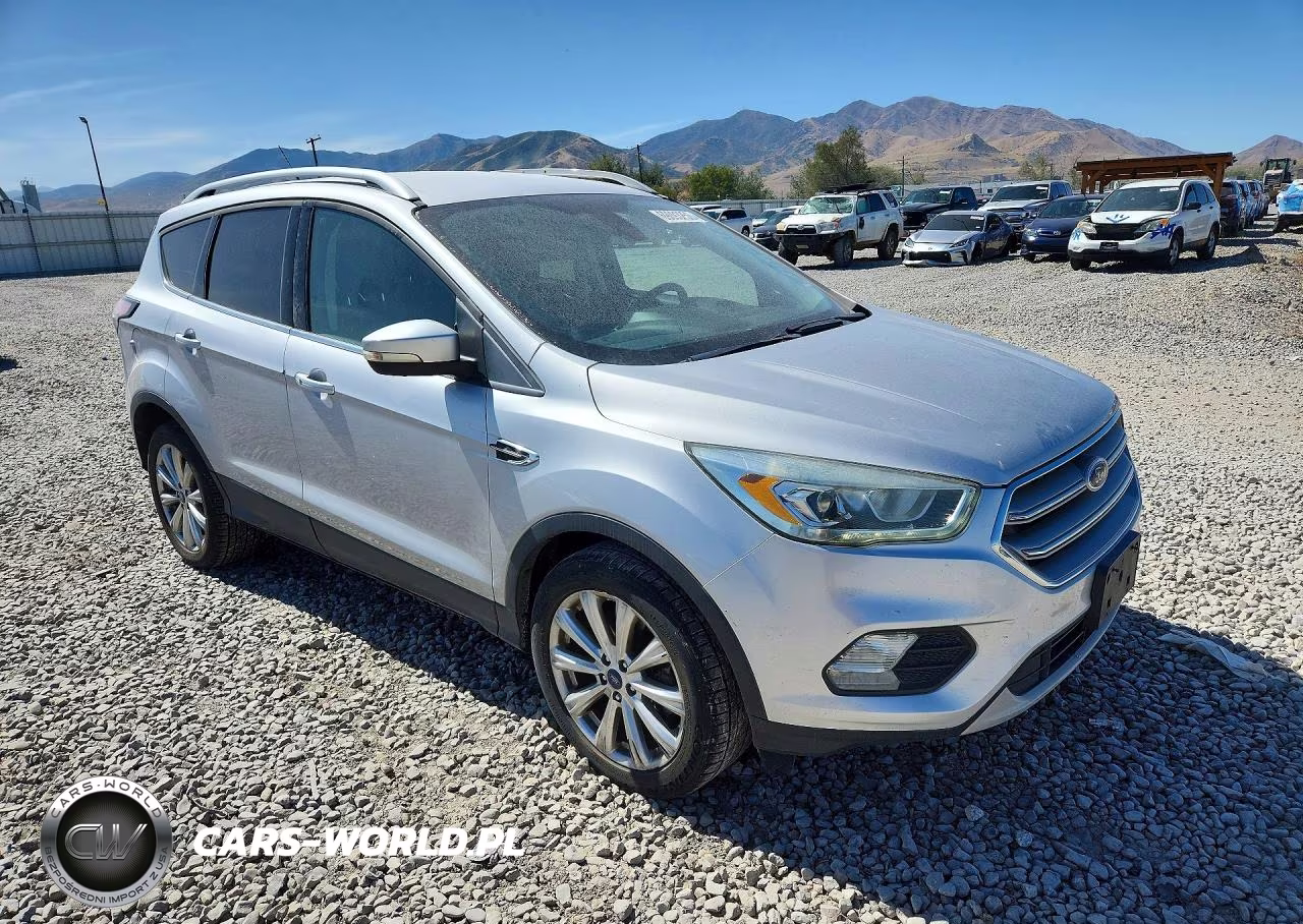 2017 Ford Escape Titanium VIN:1FMCU9J95HUB03983 - 4