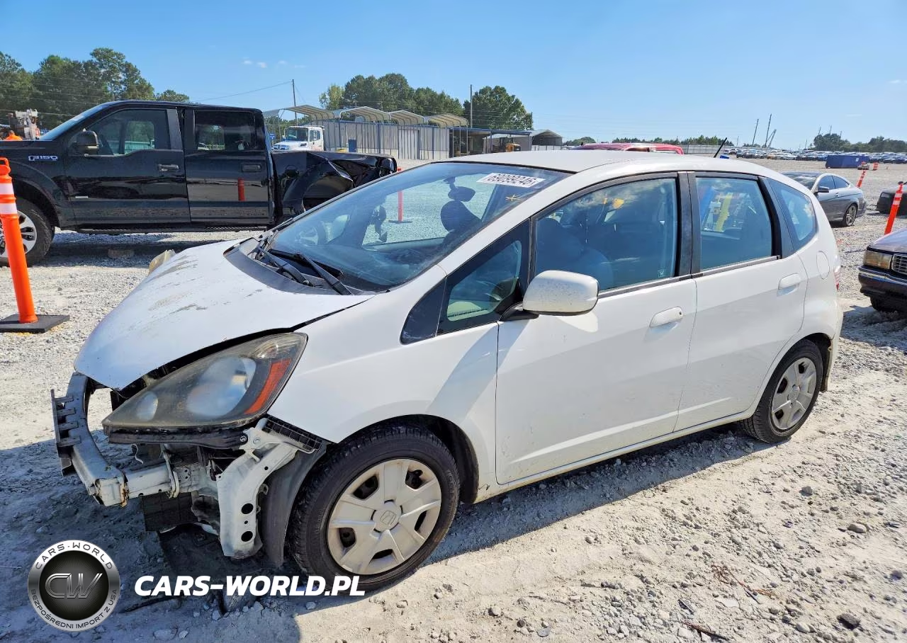 2012 Honda Fit VIN:JHMGE8H30CS000701 - 1