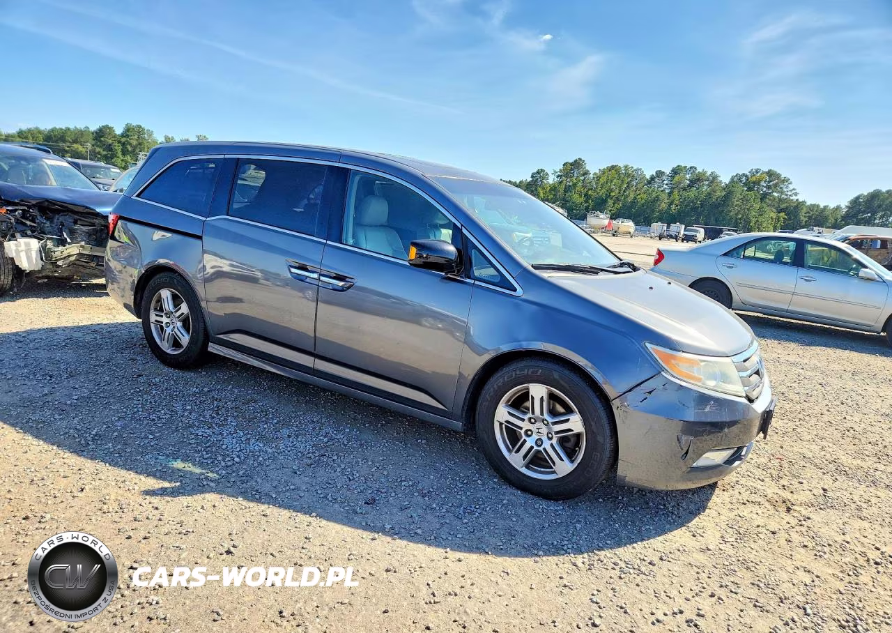 2012 Honda Odyssey Touring VIN:5FNRL5H97CB051337 - 4