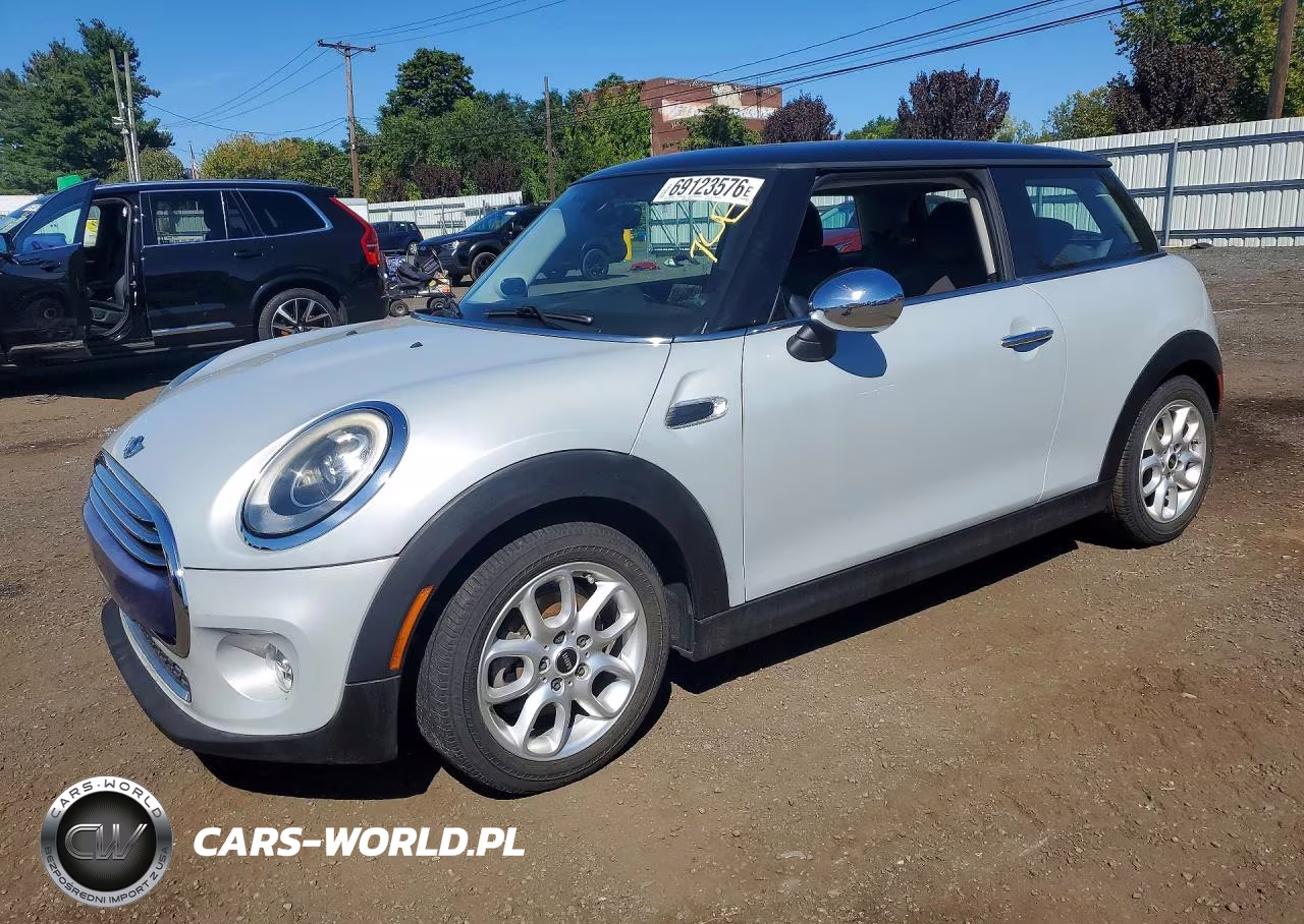 2015 Mini Cooper VIN:WMWXM5C54FT938448 - 1