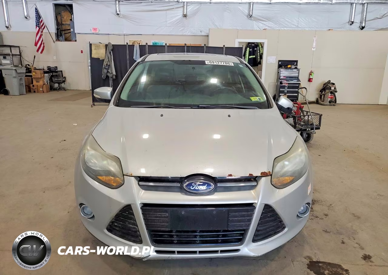 2014 Ford Focus Titanium VIN:1FADP3N28EL257251 - 5