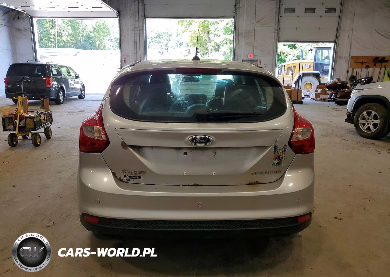 2014 Ford Focus Titanium VIN:1FADP3N28EL257251 - 6