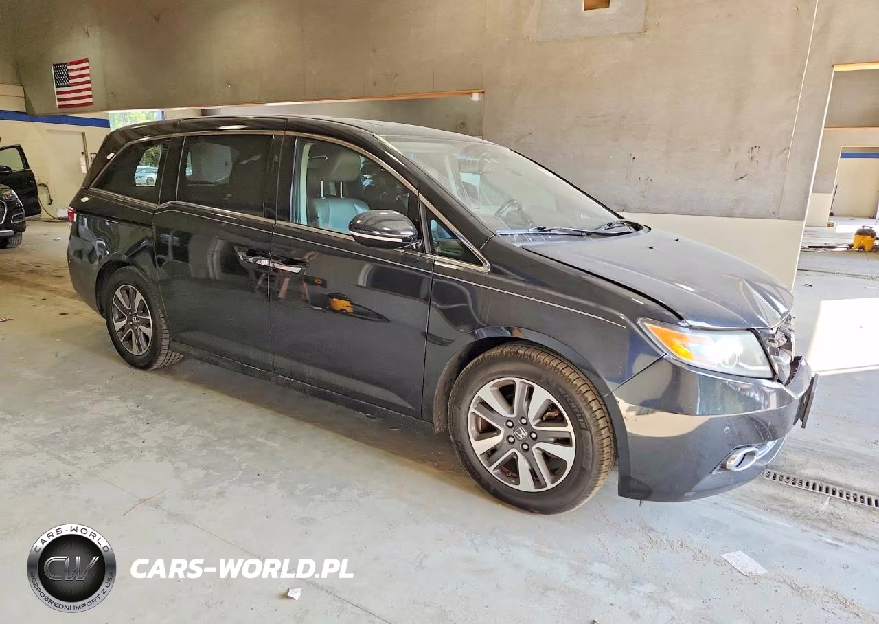 2015 Honda Odyssey Touring VIN:5FNRL5H9XFB043589 - 4