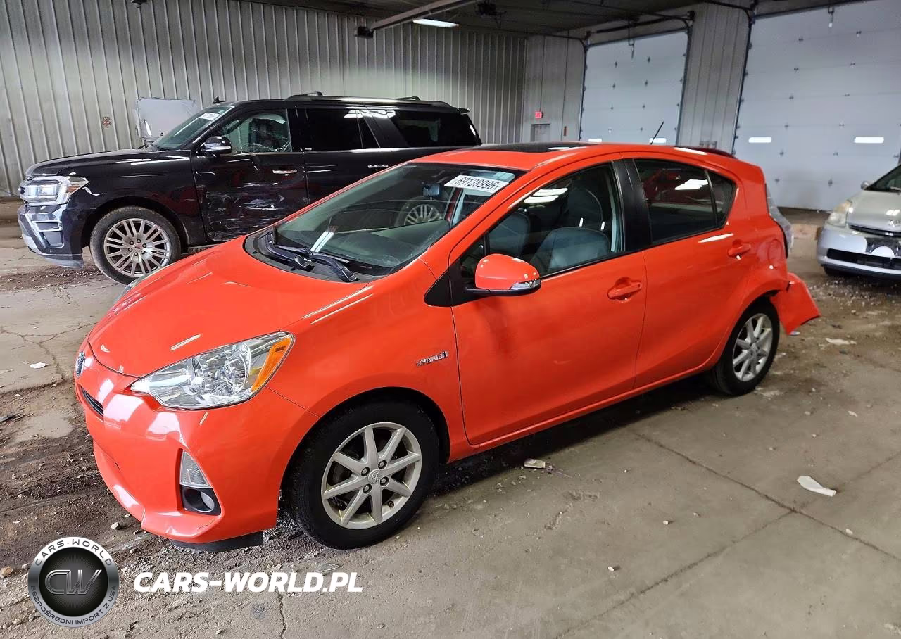 2014 Toyota Prius C Four VIN:JTDKDTB35E1059973 - 1