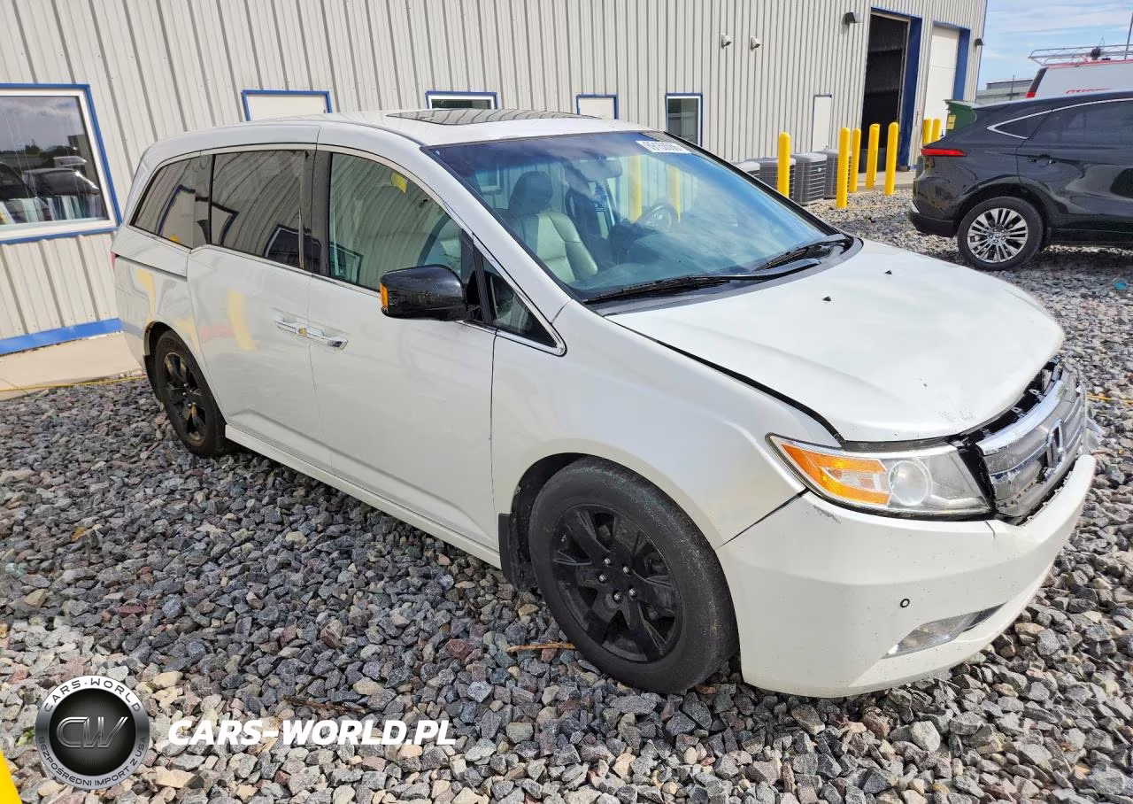 2012 Honda Odyssey Touring VIN:5FNRL5H91CB096838 - 4