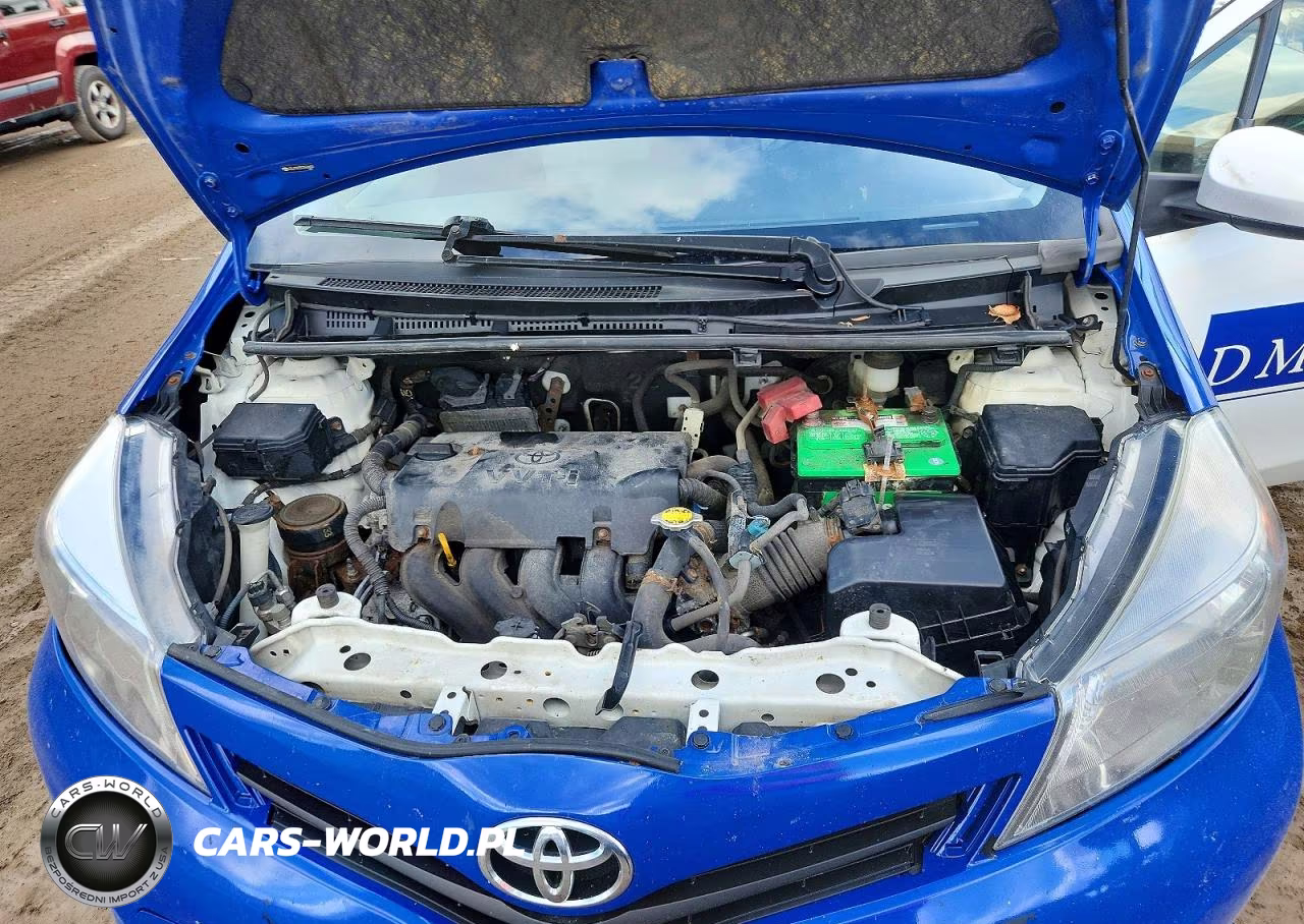 2012 Toyota Yaris 3-Door Le VIN:JTDJTUD35CD504600 - 11