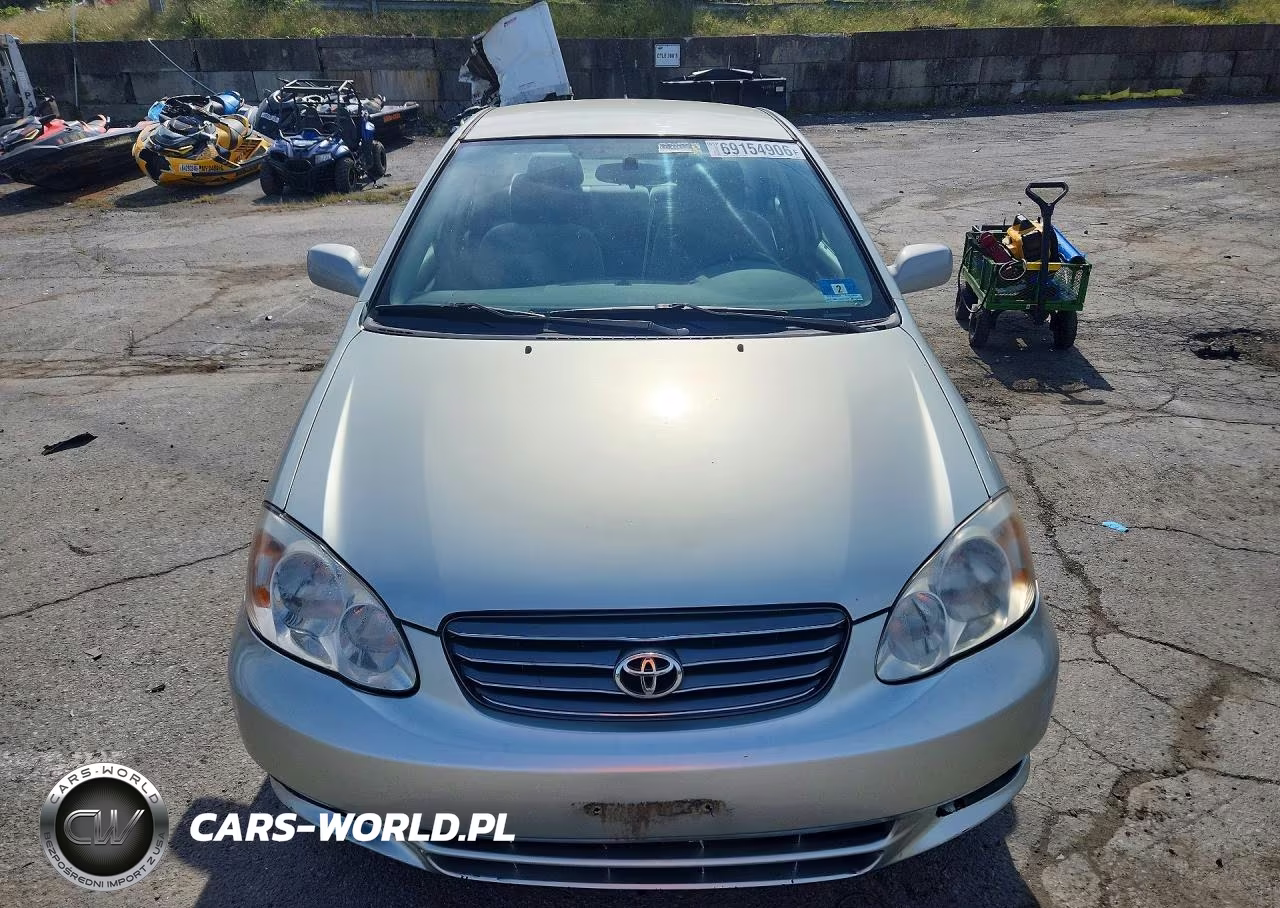2003 Toyota Corolla Le VIN:2T1BR32E43C104266 - 5