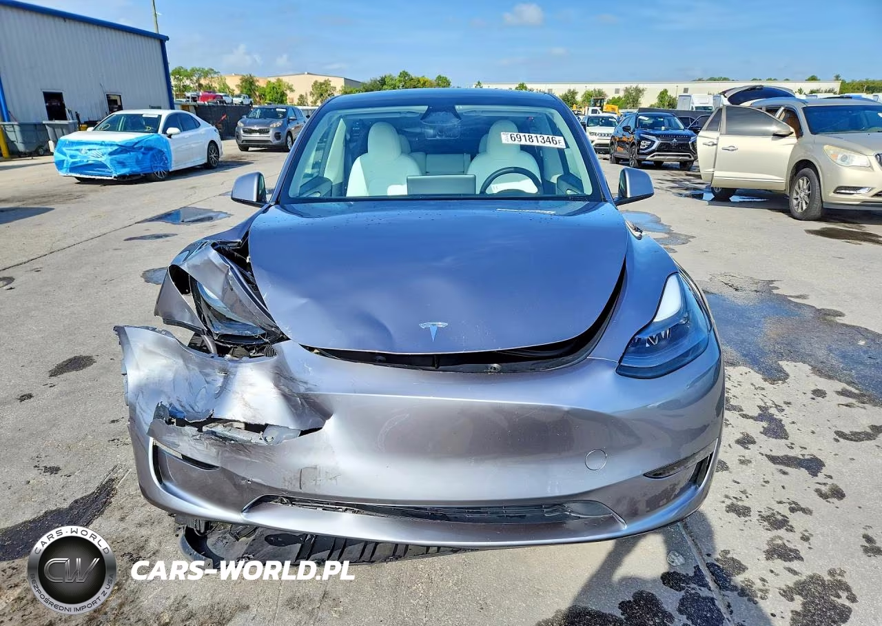 2024 Tesla Model Y VIN:7SAYGDED1RA313347 - 5