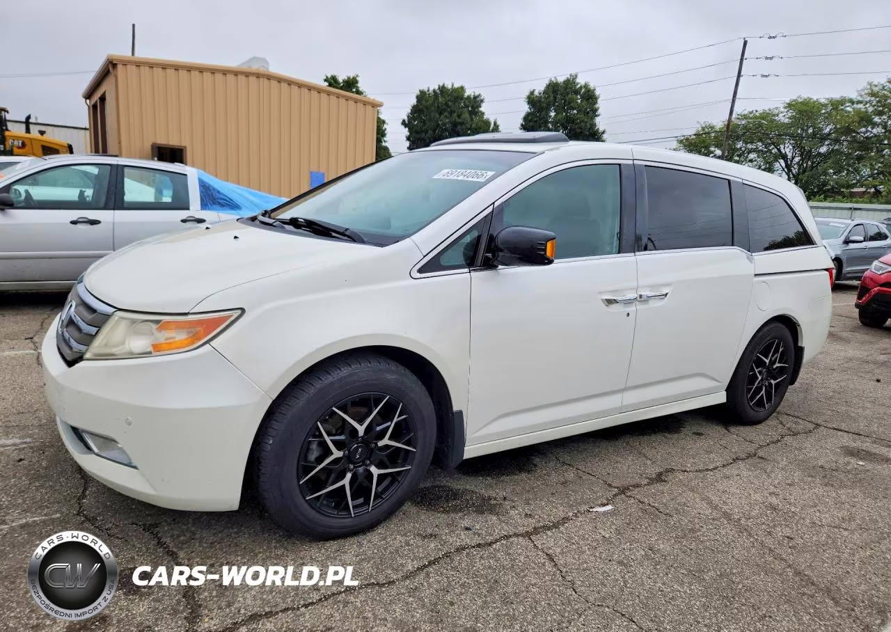 2012 Honda Odyssey Touring VIN:5FNRL5H97CB040354 - 1