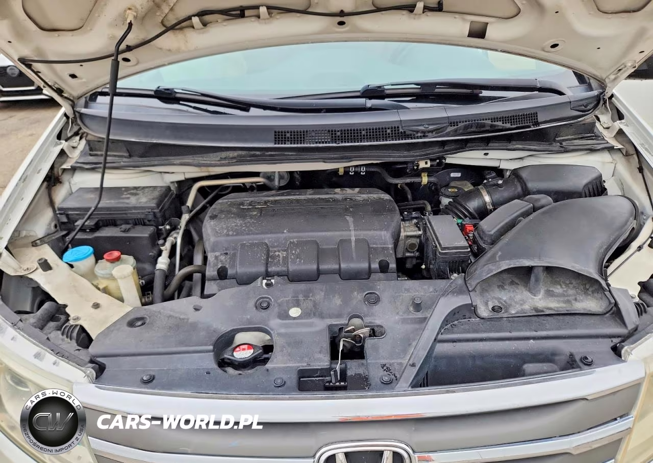 2012 Honda Odyssey Touring VIN:5FNRL5H97CB040354 - 12