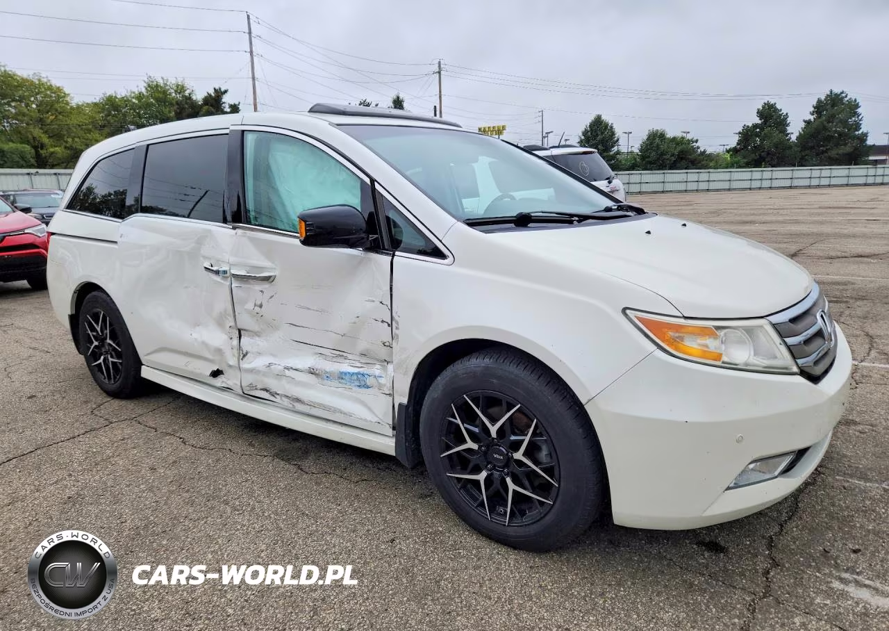 2012 Honda Odyssey Touring VIN:5FNRL5H97CB040354 - 4