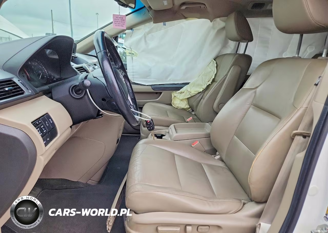 2012 Honda Odyssey Touring VIN:5FNRL5H97CB040354 - 7