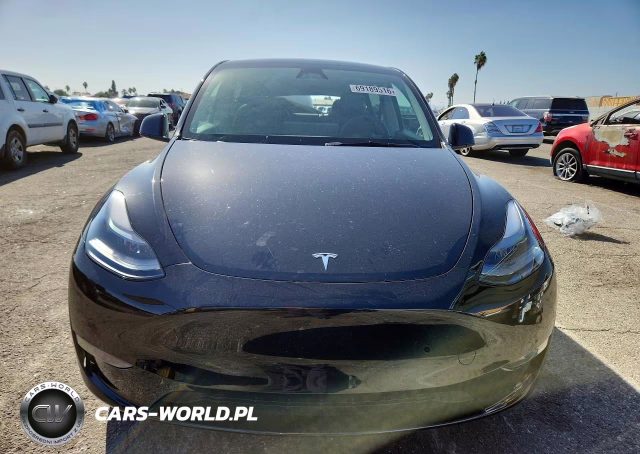 2023 Tesla Model Y VIN:7SAYGDEE7PF944628 - 5