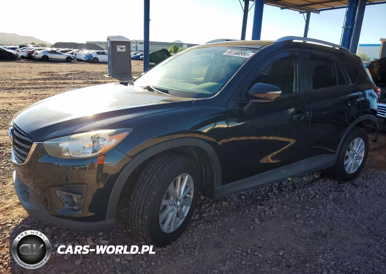 2016 Mazda Cx-5 Touring VIN:JM3KE2CY3G0601850 - 1