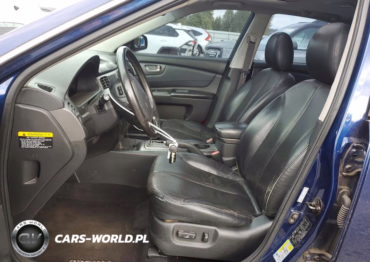 2006 Kia Optima Lx VIN:KNAGE124365028552 - 7